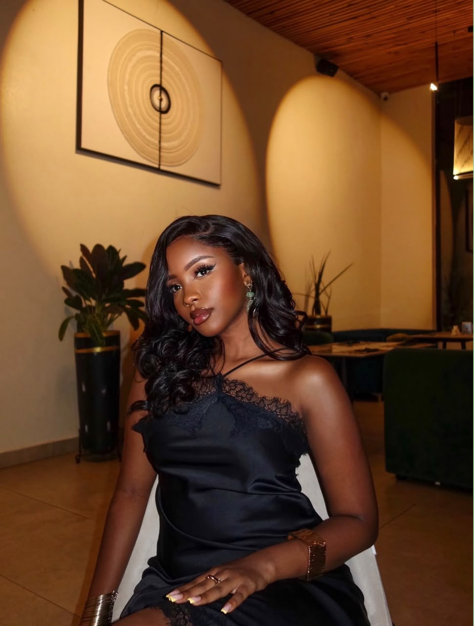 Nessahair customer wearing dark waves while seated